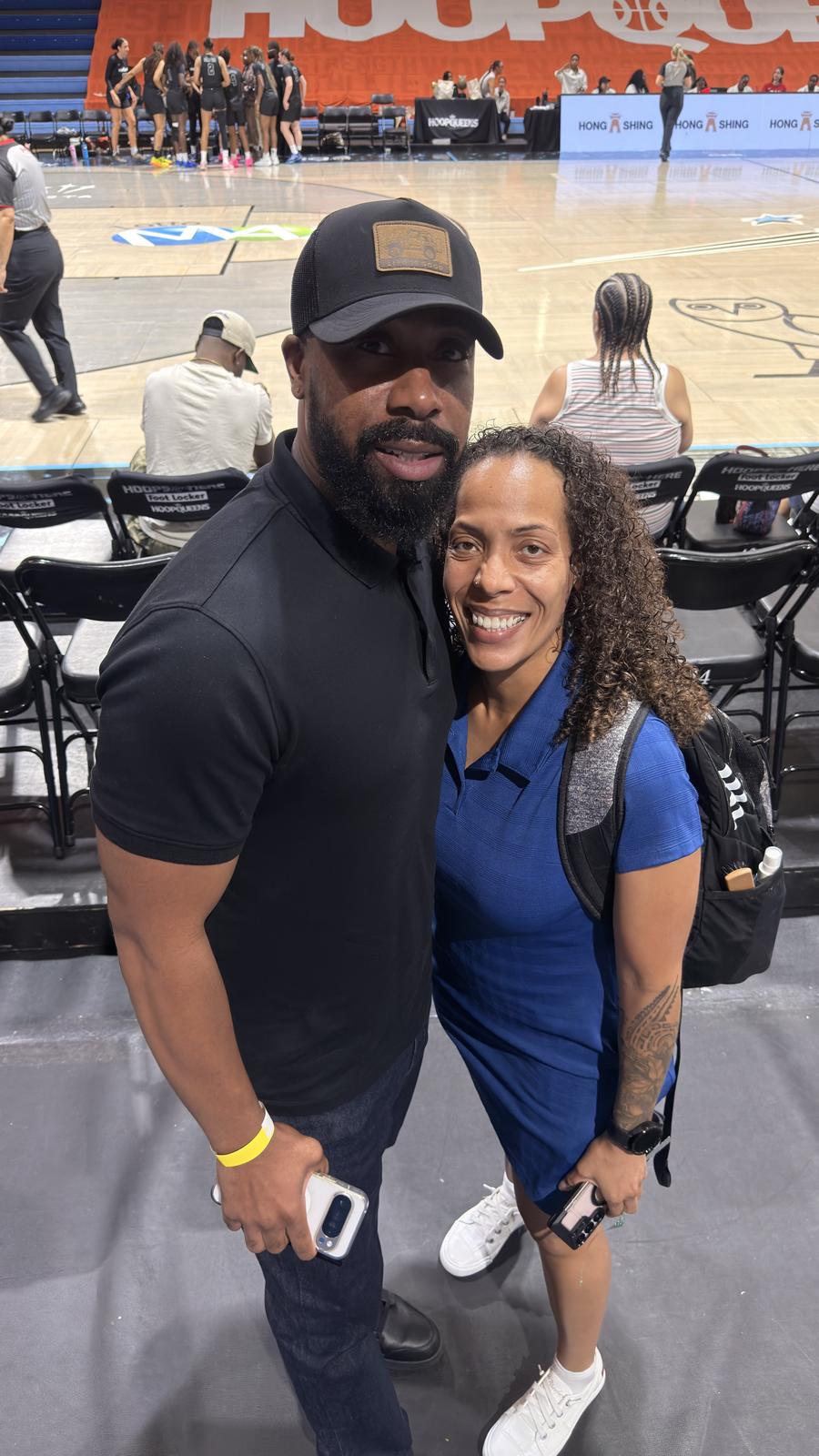 Keshia courtside at a basketball game