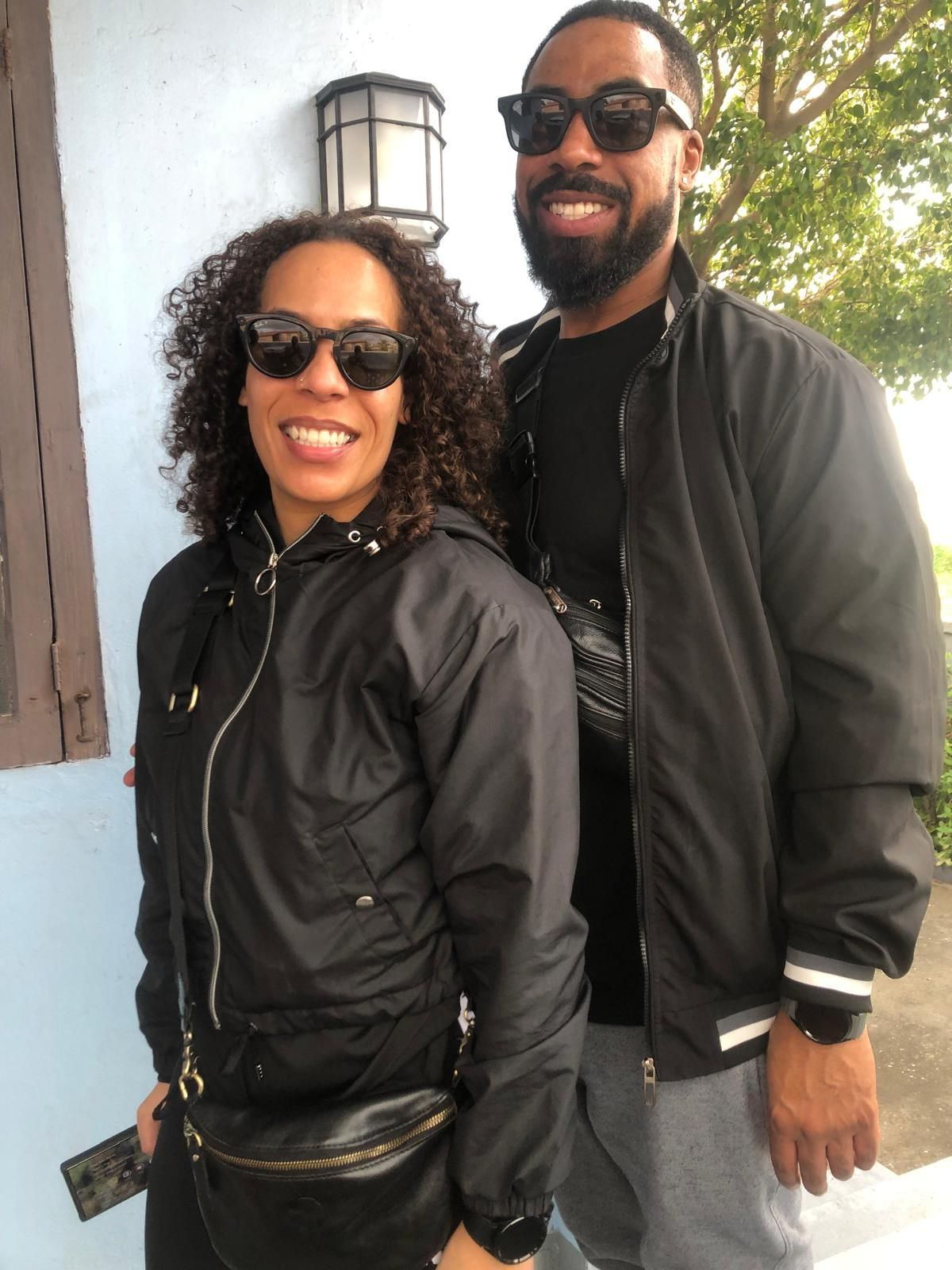 Keshia in sunglasses and a black leather jacket