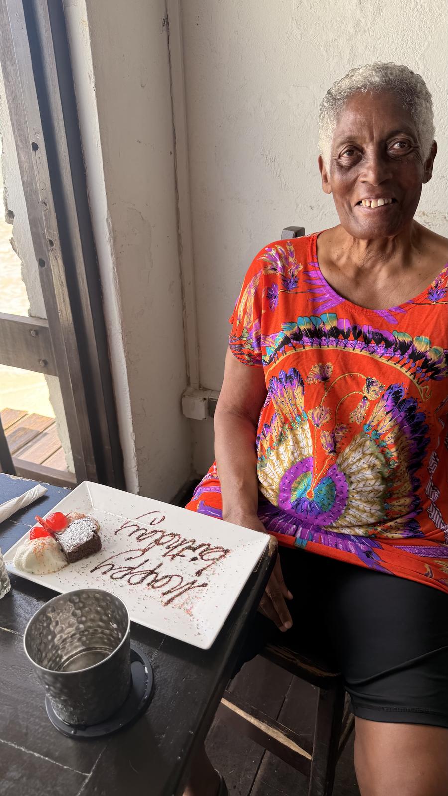 Monica with a happy birthday dessert plate